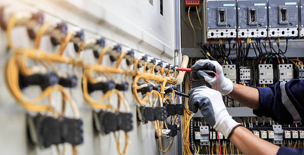 Professional Electrician technician working in Van Alstyne, TX